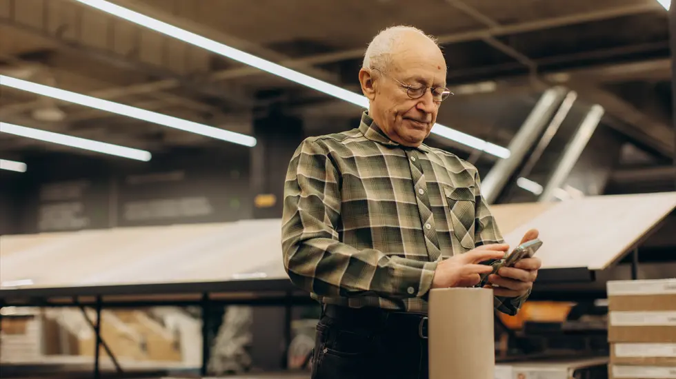 senior-peoson-searching-a-production-information-with-ai